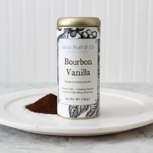 A can of bourbon vanilla on top of a plate.