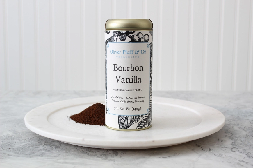 A can of bourbon vanilla on top of a plate.