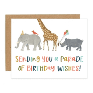 A parade of birthday wishes card with giraffes, elephants and rhino.