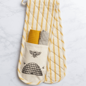 A pair of oven mitts with an image of bees on them.