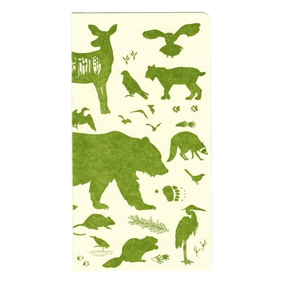 A green and white animal print paper napkin.