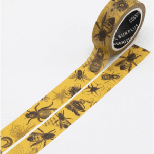 A roll of yellow tape with black bugs on it.