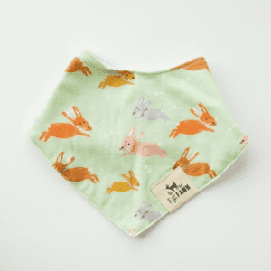 A green bandana with bunnies on it