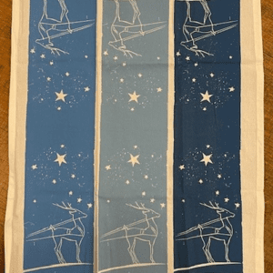 A blue and white towel with stars on it