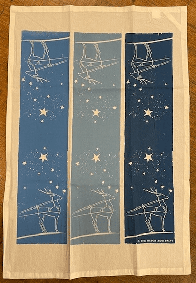 A blue and white towel with stars on it