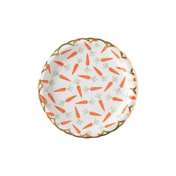 A white plate with carrots on it