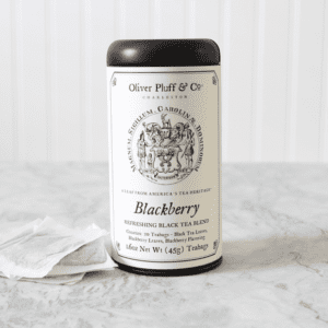 A bottle of black berry on the counter