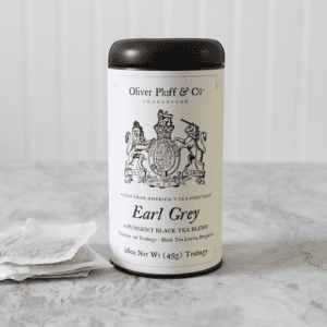 A jar of earl grey tea on the counter.