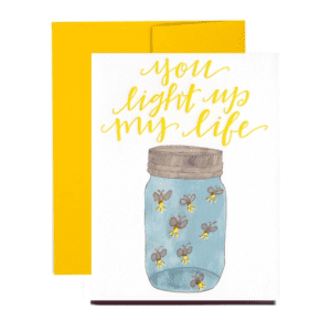 A card with a mason jar and bees on it.