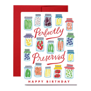 A birthday card with mason jars and pickles.