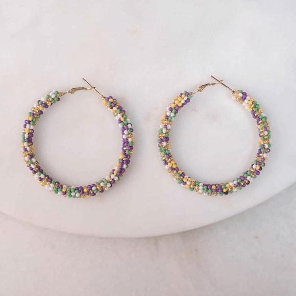 Multicolored beaded hoop earrings.