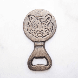 A bottle opener with an image of a tiger on it.