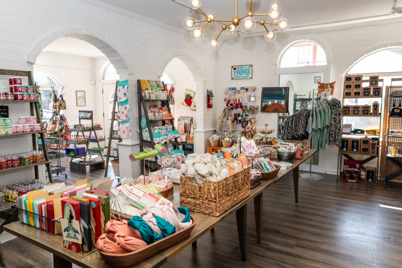 A room filled with lots of items on tables.