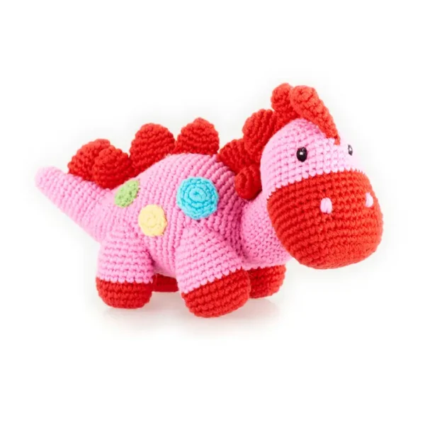 Pink and red crocheted dinosaur toy.