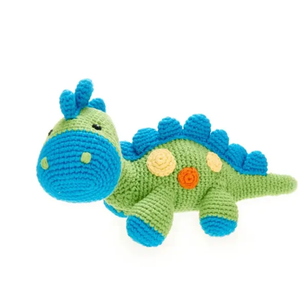 Crocheted green and blue dinosaur toy.