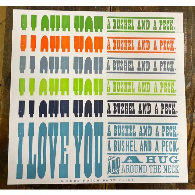 Colorful print with "I love you" and a hug.