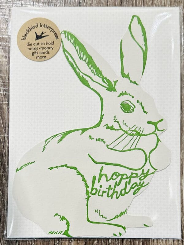 Green bunny wishing happy birthday.