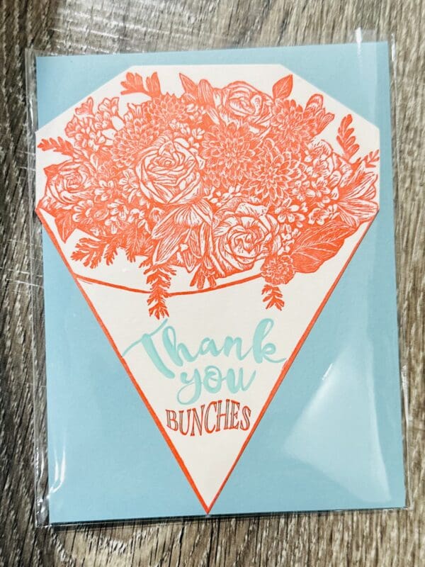 Thank you card with a floral bouquet.