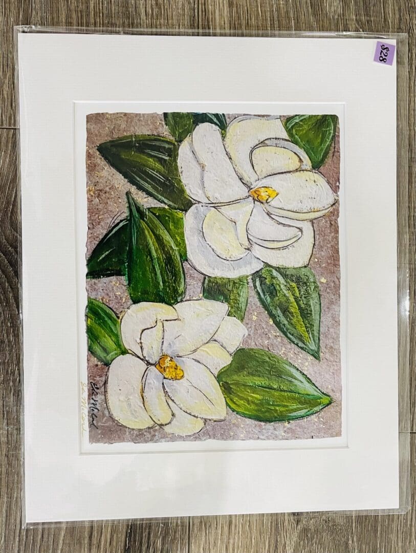 Framed painting of white magnolia flowers.