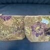 Two floral fabric zipper pouches.