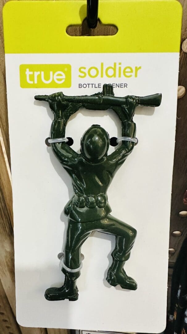 Green toy soldier bottle opener.