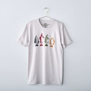 White t-shirt with four colorful fish.