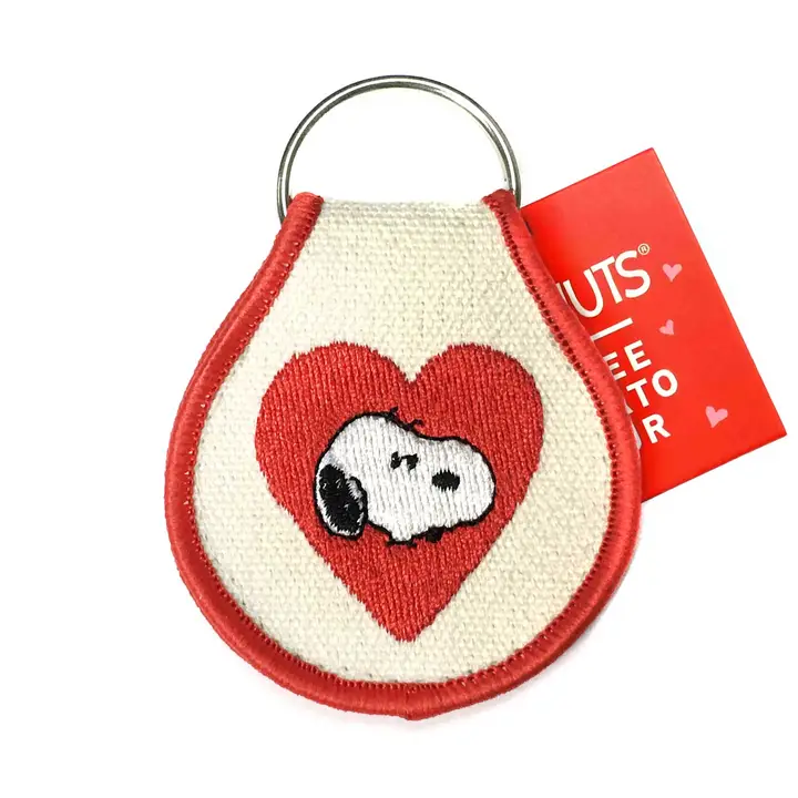 Snoopy heart keychain with red embroidery.