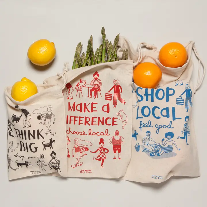 Reusable bags with "shop local" message.