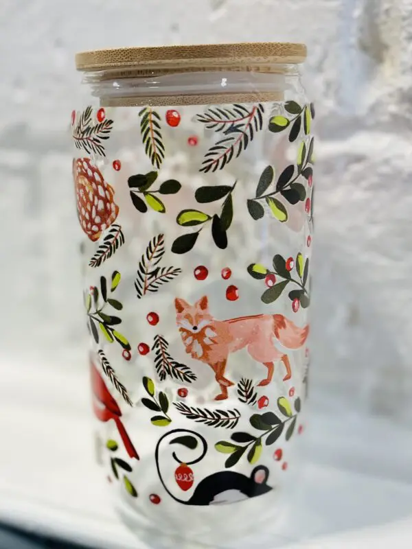 Glass jar with woodland animal print.