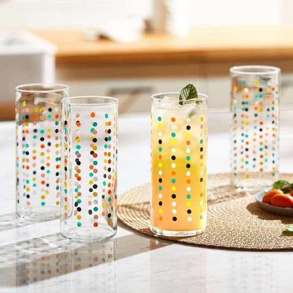 Colorful polka dot glasses with drinks.